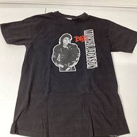 Front view of black Michael Jackson "Bad" T-shirt showing graphic print in good condition.