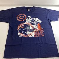 Full front view of navy blue Chicago Bears vintage T-shirt showing graphics and overall condition.