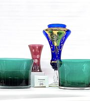 Front view of set showing large cobalt blue hand-painted vase, cranberry etched glass vase, and two teal decorative bowls