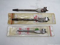 Three IRWIN Micro Dial hand tools shown side by side; two sealed in original packaging and one rusty out of package.