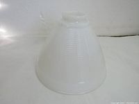 Conical vintage milk white glass floor lamp lampshade showing textured surface and top fitting.
