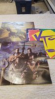 Three vinyl record covers by XTC displayed.