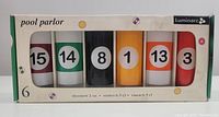 Front view of boxed set of six Luminarc Pool Parlor shooter glasses showing the billiard ball themed numbers and colors.