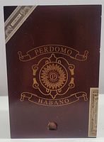 Top view of the wooden Perdomo Habano cigar box showing the logo and design in gold lettering.