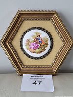 Full view of the hexagonal framed miniature porcelain picture, showing frame condition and overall size.