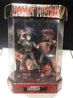 Front view of the boxed figures showing clear display case with Jason Voorhees and Freddy Krueger inside.