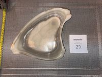 Top view of the quartz ashtray showing its shape and natural stone pattern.