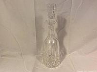 Full view of the vintage Waterford crystal wine decanter with stopper inserted.