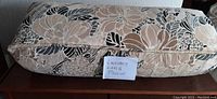 Luxury long and large pillow with floral pattern and beige color with note saying 'Luxury Long Pillow'