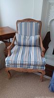 Full front view of chair with cushions