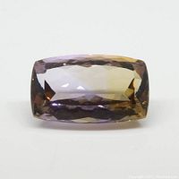 Front view of the rectangular cushion ametrine gemstone showing the purple and yellow color zones.