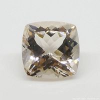 Front view of the cushion-shaped morganite gemstone showing clarity and faceting