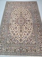 Full top view of rug showing overall pattern and condition
