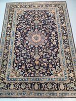 Overall view of rug laid flat on floor