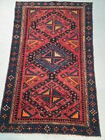 Full top view of rug showing overall geometric pattern and color scheme