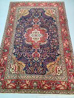 Full front view of rug showing overall pattern and condition