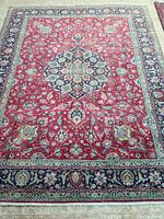 Overhead view of full rug showing overall design and border