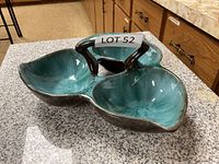Three-section Blue Mountain ceramic serving dish with central handle in turquoise blue glaze.