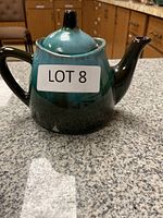Blue Mountain Pottery teapot front view showing gradient glaze and lid