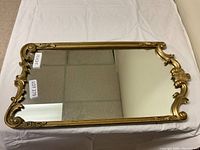 Top view of rectangular mirror showing full size and frame design.