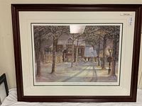 Full-frame view of the framed print leaning against wall