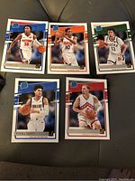 Photo showing five Donruss Rated Rookie basketball cards including Saben Lee (Detroit Pistons), Talen Horton-Tucker (Los Angeles Lakers), Brook Lopez (Milwaukee Bucks), Tyrell Terry (Dallas Mavericks), and Derrick White (Toronto Raptors).