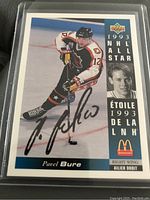 Front of autographed 1993 NHL All Star Pavel Bure hockey card showing player image and signature