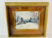 Framed print showing overall view of winter road scene with houses and trees, vintage wood frame.