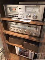 Cassette deck and receiver installed in wood shelving