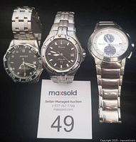 Three men's watches displayed together with a MaxSold lot card: Willon, Bulova, Kenneth Cole.