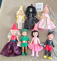 Photo of all six Madame Alexander collectible dolls from McDonald exclusives, showing varied costumes and styles.