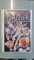 Full front cover of Dazzler #1 comic book showing main character and Marvel Comics Group branding, in protective bag.