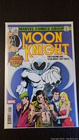 Front cover photo of Moon Knight #1 comic reprint, showing colorful cover art and mint condition