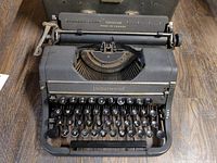 Close-up of Underwood Universal typewriter showing keyboard and nameplate details, demonstrating vintage condition and key layout.