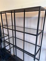 Side angled view showing multiple shelves and frame construction.