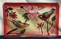 Full view of the rectangular fused glass tray showing bird and flower motif with red border.