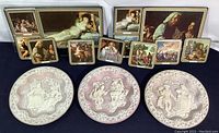 Full view of three collector plates and two boxes of coasters and placemats, all Shakespeare themed.