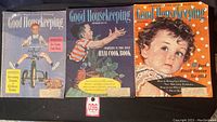 Three Good Housekeeping magazines from the 1950s displayed side-by-side showing cover art and titles.