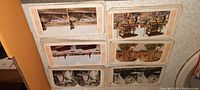 Several stereoview cards arranged in pile showing different images including Asian scenes, weddings, and city views in color and black and white.
