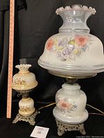 Both vintage-style lamps shown together for scale next to a ruler. Larger lamp approximately 24 inches tall, smaller lamp approximately 14 inches.