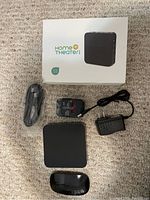 Single 4K Home Theater Android Box with accessories including remote, HDMI cable, power adapter, and box.