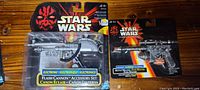 Front view of Flash Cannon Accessory Set in original Star Wars packaging featuring character image resembling Darth Maul.