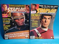 Two Starlog magazines standing side by side showing covers, one with Geordi La Forge and one with Spock, titles and text visible.