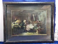 Full front view of the framed antique print "The Doctor" showing the scene with the doctor, child, and somber figures in an interior setting, with visible tiger's eye gesso frame.