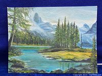 Front view of the painting showing the full scenic landscape of Maligne Lake with detailed mountain and tree depiction.