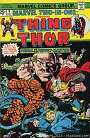 Front cover of Marvel Two-in-One #9 comic book showing The Thing and Thor battling Puppet Master and Radon the Atomic Man.