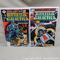 Two bagged and boarded vintage Battlestar Galactica Marvel comics side by side showing front covers of issues 3 and 4.