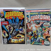 Front cover of Guardians of the Galaxy #22 comic book showing Starhawk in center flying with team.
