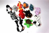Lot of 12 vintage Ty Beanie Babies, all with original tags, displayed together on a white background, showing full lot contents.
