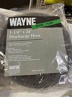 Full view of the 24-foot corrugated sump pump discharge hose coiled and sealed in original packaging showing brand, size, and basic details.